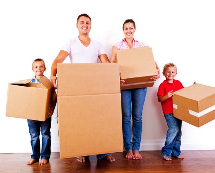 Flat removals team handling furniture in Stockwell