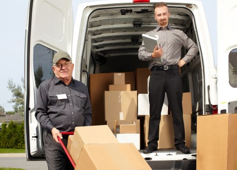 Removal team planning a local move in Stockwell with boxes and furniture