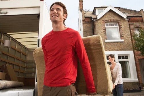 Loading furniture into a van for a local Stockwell removal