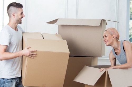 Moving crew handling furniture during a local relocation