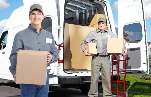 Stockwell moving team handling furniture and boxes safely