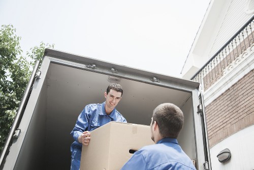 Local moving van navigating a Stockwell street