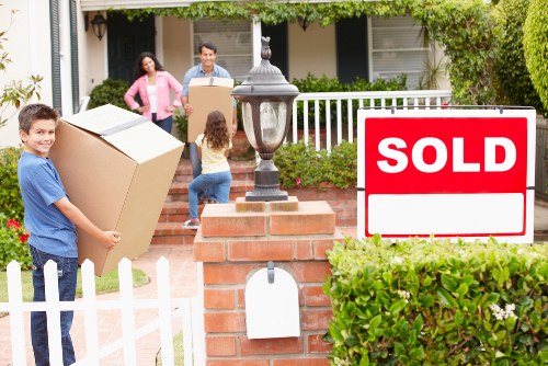 Packed moving boxes and furniture prepared for Stockwell home removal